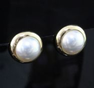 A pair of Tiffany & Co 14ct gold and mabe pearl ear clips, of circular form, in Tiffany & Co box,