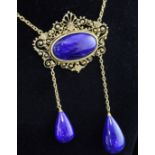 A 20th century high carat gold and lapis lazuli necklace, the pierced cannetile work cartouche motif