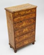 An unusual small Dutch marquetry inlaid walnut chest, of five drawers, on turned feet, W.1ft 8.5in.
