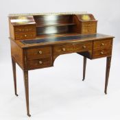 A Sheraton Revival mahogany and painted writing desk, decorated with cherubs after Cipriani and