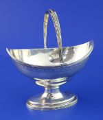 A George III silver Adams style sugar basket by Peter & Ann Bateman, with reeded border, engraved