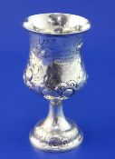 A Victorian repousse silver goblet with presentation inscription relating to the Oundle Cycling