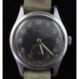 A 1940's stainless steel Swiss made Mimo German military issue wrist watch, with black Arabic dial