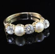 An 18ct gold, split pearl and diamond five stone half hoop ring, with scroll setting, size O.