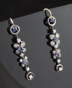 A pair of Edwardian gold and silver, sapphire and diamond set drop earrings, with graduated