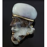 A 20th century gold mounted white opal pendant brooch modelled as the head of a Middle Eastern