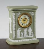 A Wedgwood sage green jasper timepiece, early 20th century, typically decorated with white sprigs of