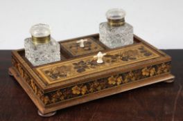 A Tunbridge ware rosewood floral mosaic and perspective cube inkstand, with twin inkwells, 10.5in.