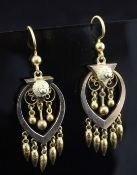 A pair of Victorian style two colour gold drop earrings, each hung with teardrop and spherical
