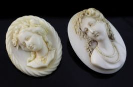 Two early 20th century ivory cameos, each carved in relief with the bust of a lady with their