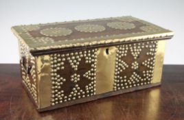 An unusual small brass mounted Zanzibar chest or work box, with two side handles, the hinged lid