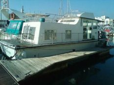 The Houseboat "Medusa", 39ft, as moored at Denton Island, Newhaven, fibre glass hull, well