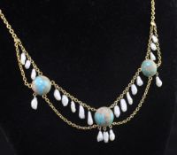 An Edwardian 9ct gold cabochon turquoise and baroque pearl drop necklace, with chain swags, 15.5in.