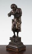 Karl Kauba (1865-1922). A bronze 'A Bookworm', 1922, signed and titled to the base, 10in.