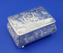 A late Victorian Scottish silver bombe shaped box with hinged cover, embossed with exterior and