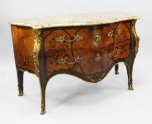 A Louis XV style marble topped bombe shaped commode, decorated all over with floral marquetry