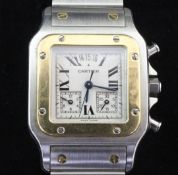 A gentleman's Cartier steel and gold Tank Francais chronograph wristwatch, with Roman dial, two