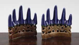 A pair of Chinese blue and cafe au lait glazed 'mountain peak' brush rests, 18th century, the