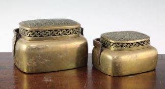 Two Chinese bronze hand warmers, 18th / 19th century, in two sizes, both pierced with 'wan'