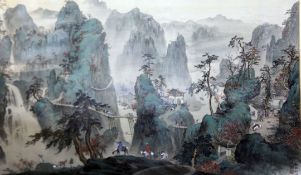 A Chinese School landscape painting on paper, early 20th century, depicting figures in a mountainous