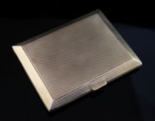 A late 1920's engine turned 9ct gold cigarette case by Asprey & Co, of rectangular form, with