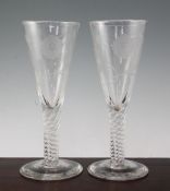 A pair of Jacobite style large glass goblets, early 20th century, each wheel engraved with a rose