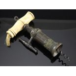 A Victorian Thomason type barrel corkscrew, with turned bone handle and Royal coat of arms plaque,