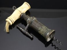 A Victorian Thomason type barrel corkscrew, with turned bone handle and Royal coat of arms plaque,