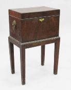 A 19th century mahogany rectangular cellaret, with lion mask ring handles and ropetwist handles,