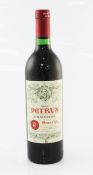 One bottle of Chateau Petrus 1982, Pomerol; into neck, light scuffs to label, minor nick to bottom