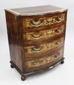 An Edwardian marquetry inlaid rosewood bowfront chest, of four graduated long drawers, W.2ft 10in.