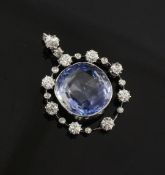 A white gold, sapphire and diamond drop pendant, of circular form, with round brilliant cut