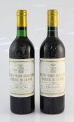 Two bottles of Chateau Pichon Lalande 1986, Pauillac; one high fill, one base of neck. A strong