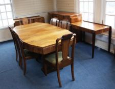 An Art Deco ten piece rosewood dining suite, includes a shaped extending dining table with six