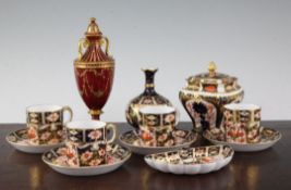 A group of Royal Crown Derby Imari wares and a similar scarlet ground gilt decorated two handled