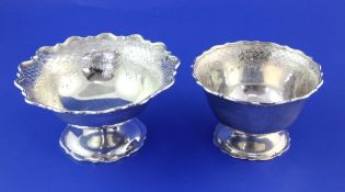 An early Victorian silver pedestal bowl, of circular form, with wavy border and engraved trellis and