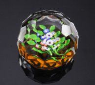 A St Louis honeycomb facetted millefiori 'nosegay' paperweight, late 19th century, the nosegay