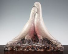 A French Art Deco pottery group of two doves, modelled by Genevieve Granger, decorated in mottled