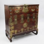 A Korean brass bound elm cabinet, with hinged drop front and shaped bracket feet, W.3ft 1in.