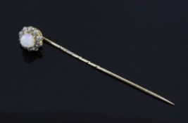 An early 20th century gold, white opal and diamond cluster stick pin, 2.25in.