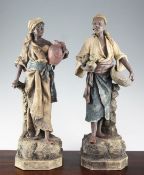 A pair of Austrian painted terracotta figures by Johann Maresch, modelled as male and female arab