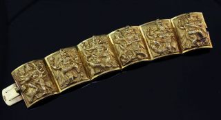 A Victorian Indian Colonial 22ct gold "Swami" style bracelet by Peter Nicholas Orr, each of the