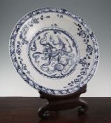 An Annamese blue and white dish, 15th / 16th century, the cover boldly painted to the centre with