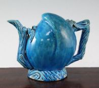 A Chinese turquoise glazed peach shaped cadogan type wine pot, 19th century, the spout handle and