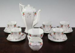 A Shelley fruit design fourteen piece Queen Anne shape coffee set, 1930's, green printed Shelley