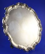 A late Victorian large silver salver, by Elkington & Co Ltd, of shaped circular form, with foliate