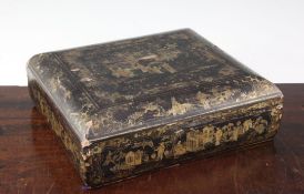 A Chinese gilt decorated black lacquer games box containing a large quantity of engraved mother of