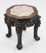 A Chinese rosewood urn stand, with inset rouge marble top, with pierced frieze and scrolling