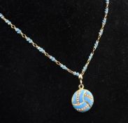 A Victorian gold, turquoise enamel and seed pearl set locket pendant necklace, of circular form,