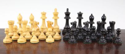 A Staunton pattern boxwood and ebony chess set, complete with thirty two pieces, together with a